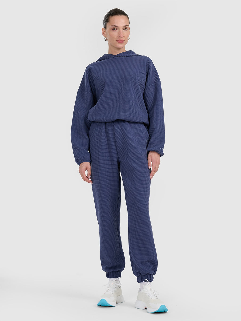 Spodnie Damskie 4F CAS F1184 Dresowe Niebieskie Dzianina Waflowa