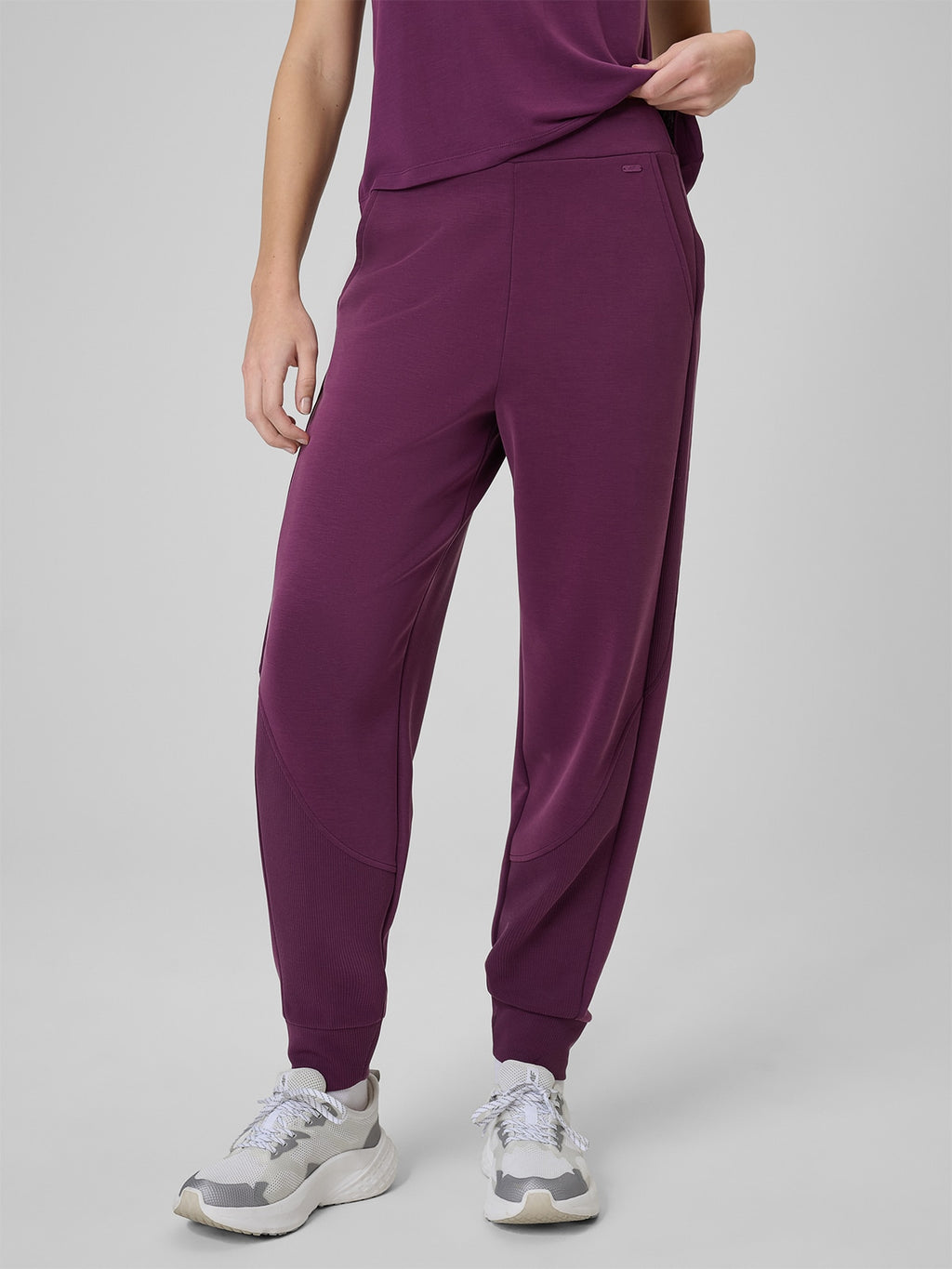 Spodnie Damskie 4F 4FWSS26TTROF1410 Sportowe Fiolet Modal